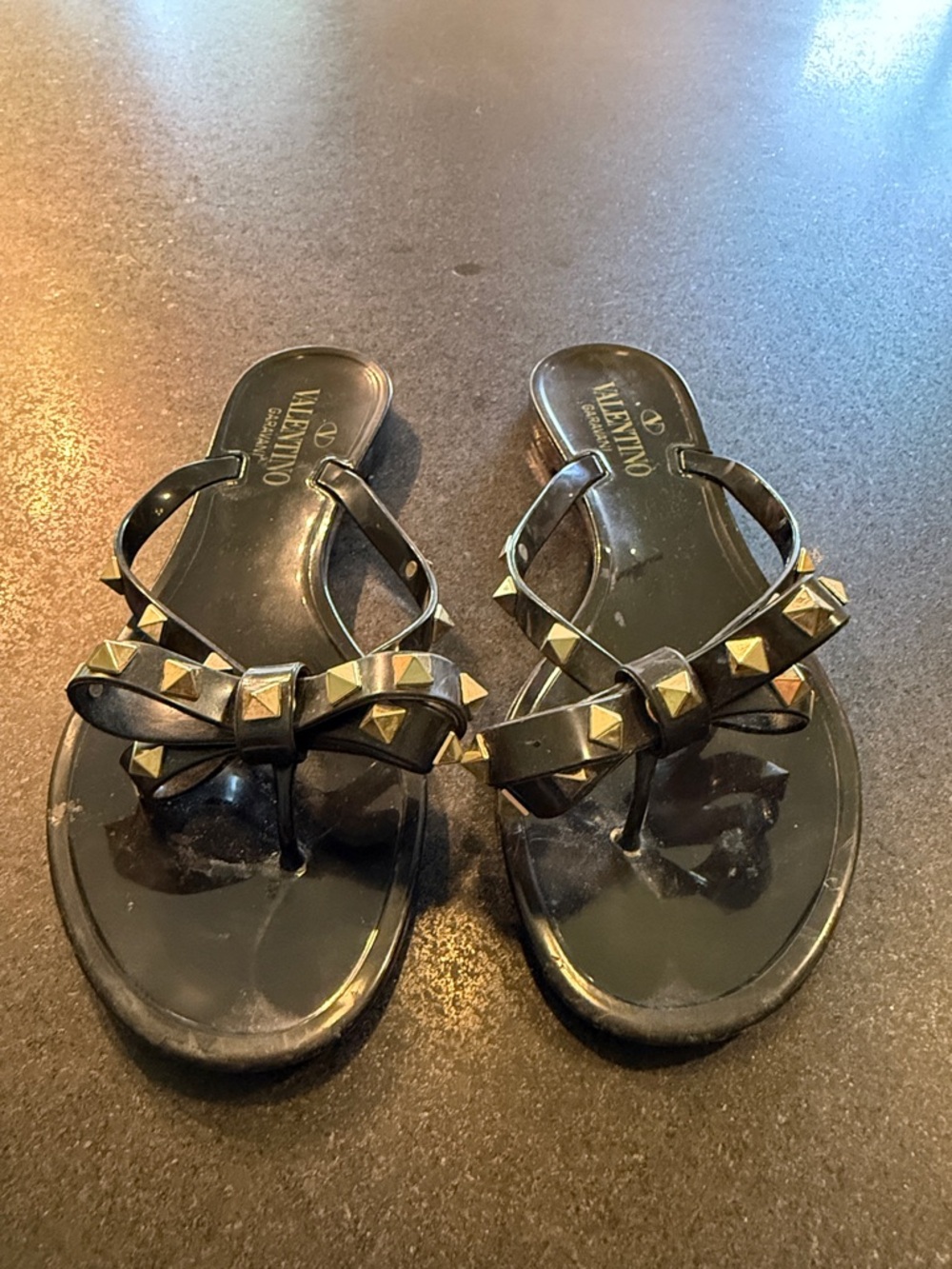 Valentino Black Jelly Bow Thong Sandals with Gold Rockstuds